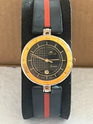 Reloj Lotus Negro y Dorado