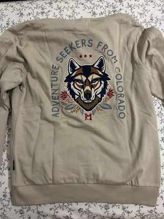 Sudadera beige con logo de lobo sin estrenar