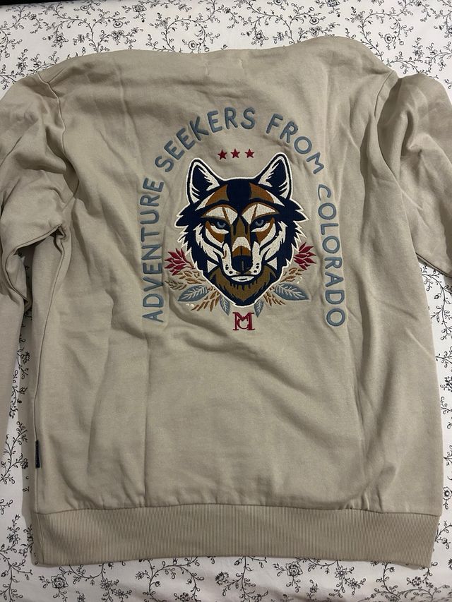 Sudadera beige con logo de lobo sin estrenar