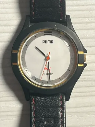 Reloj Puma Negro y Dorado