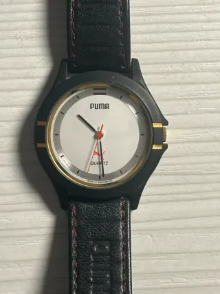 Reloj Puma Negro y Dorado