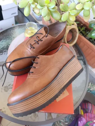Zapatos de piel con plataforma
