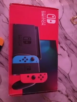 Nintendo Switch Rosa y Morado