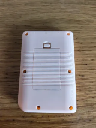 Mini consola de juegos rosa