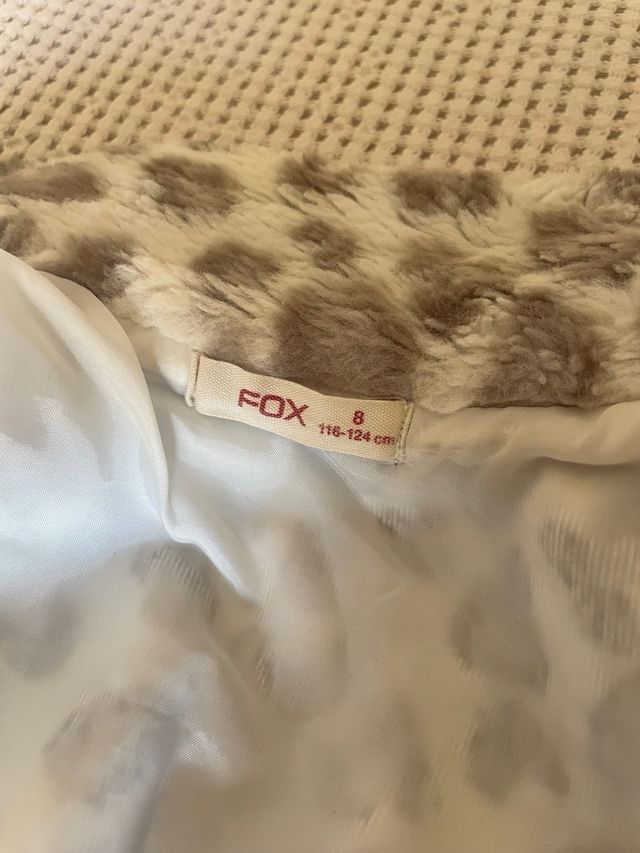 Chaleco de niña animal print con cremallera