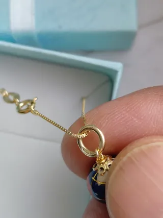 Collana con ciondolo mappamondo