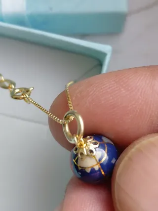 Collana con ciondolo mappamondo