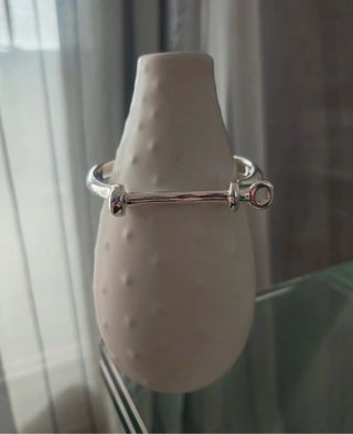 Pulsera grillete, Uno de 50