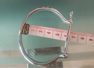 Pulsera grillete, Uno de 50