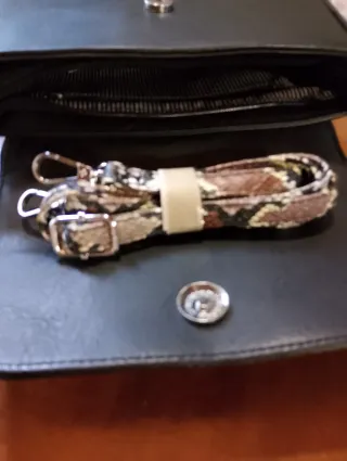 Borsa nera con fiocco pitonato