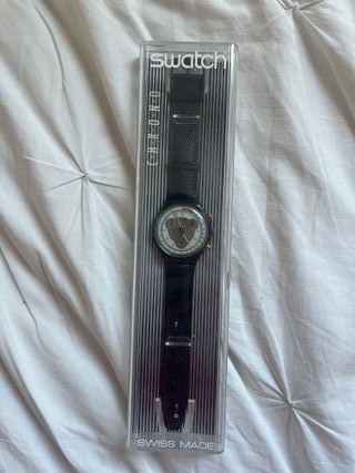 Reloj Swatch Chrono Negro y Dorado