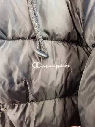 Piumino Champion nero con cappuccio