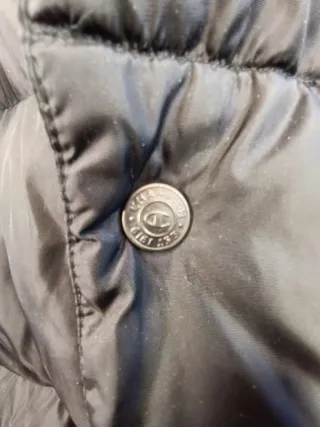 Piumino Champion nero con cappuccio