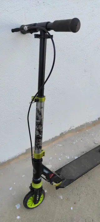 Patín plegable con ruedas verdes