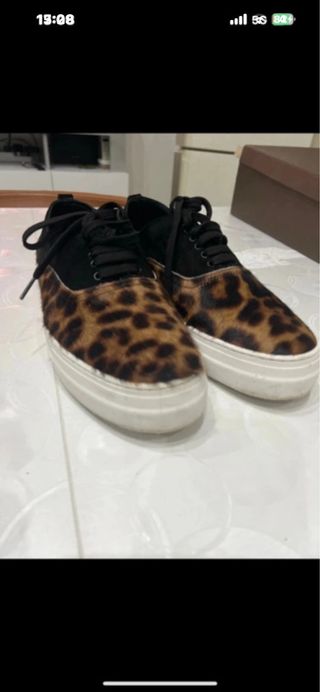 Scarpe uomo leopardate nere