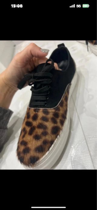 Scarpe uomo leopardate nere