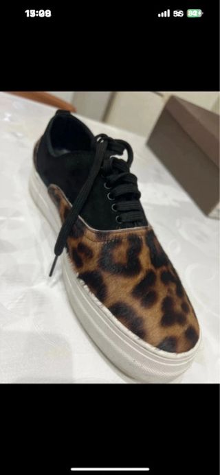 Scarpe uomo leopardate nere
