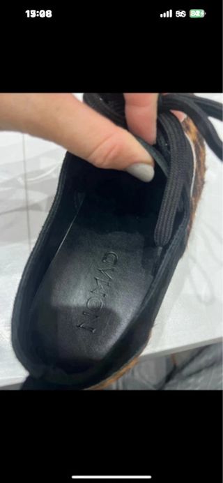 Scarpe uomo leopardate nere