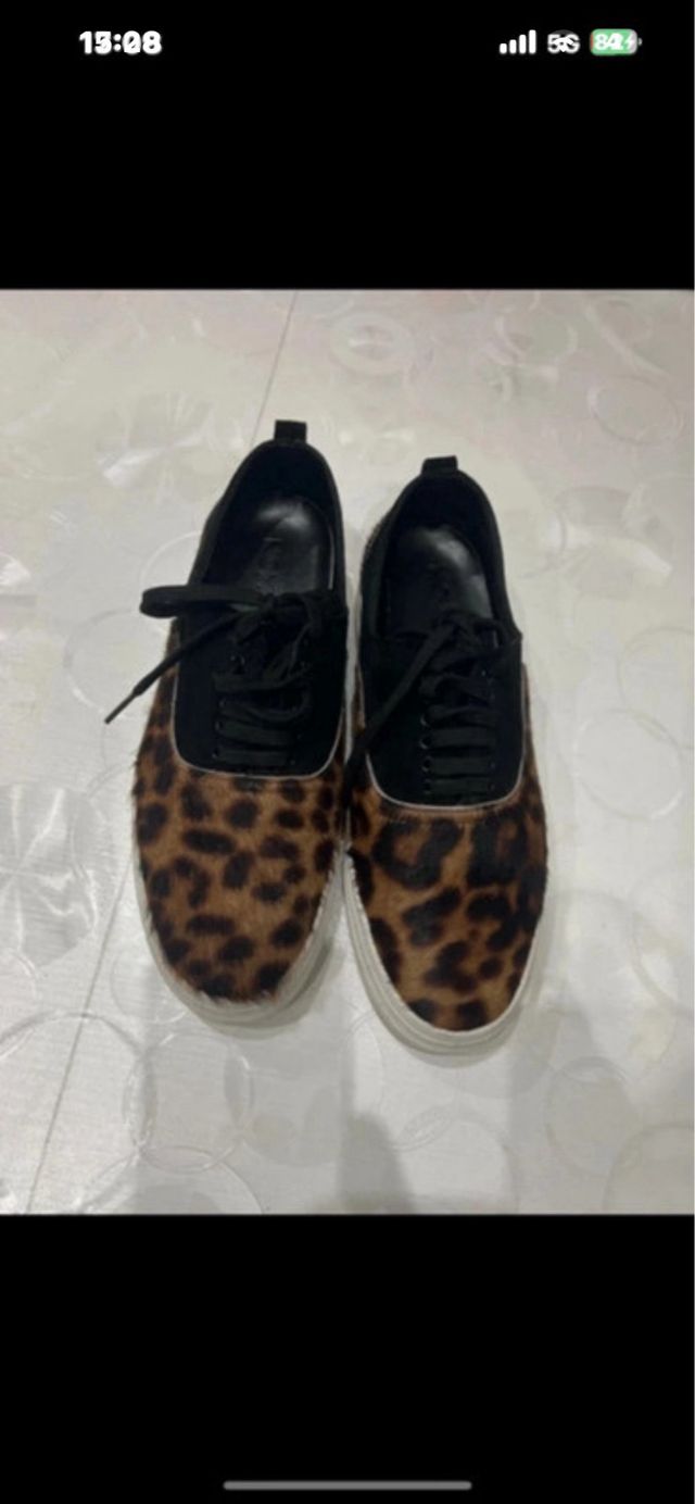 Scarpe uomo leopardate nere