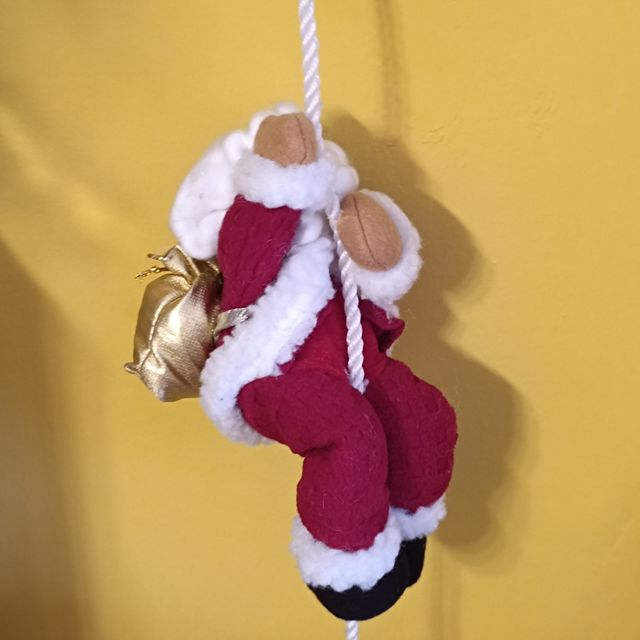 Papá Noeles trepadores por cuerda