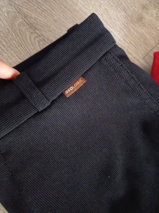 Giacca smanicata rossa, guanti e pantaloni equitaz