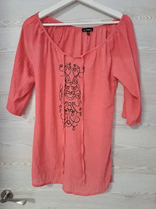 Blusa naranja Le Chateau