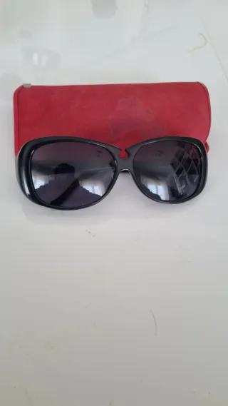 Occhiali da sole Miu Miu SMU04A neri