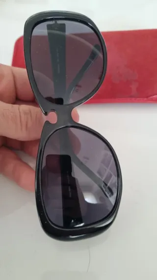 Occhiali da sole Miu Miu SMU04A neri