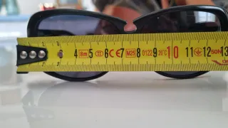 Occhiali da sole Miu Miu SMU04A neri