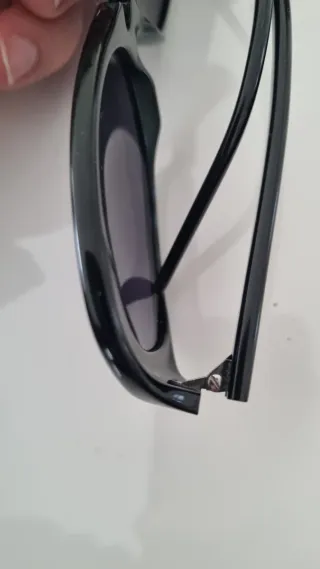 Occhiali da sole Miu Miu SMU04A neri