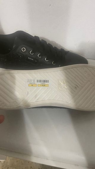 Zapatos negros de moda