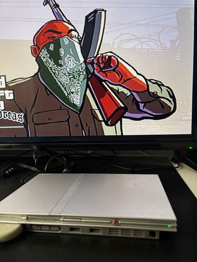 Consola PS2 Slim Plateada + 14 Juegos + 2 mandos.