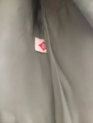 Cappotto verde con collo pelliccia