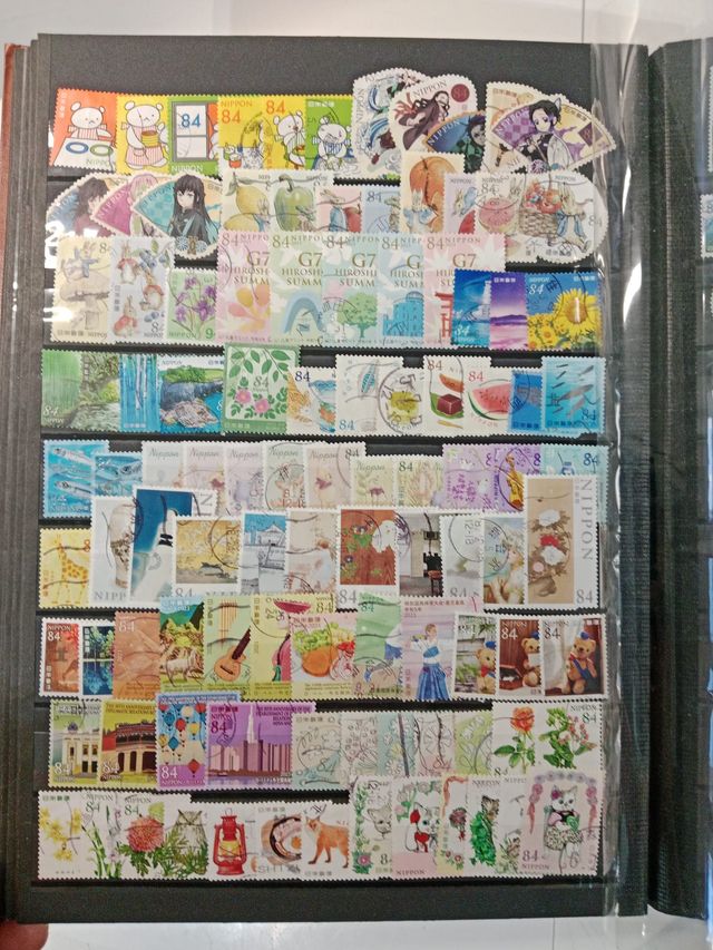 Classificador 1200 selos Japão 32 páginas