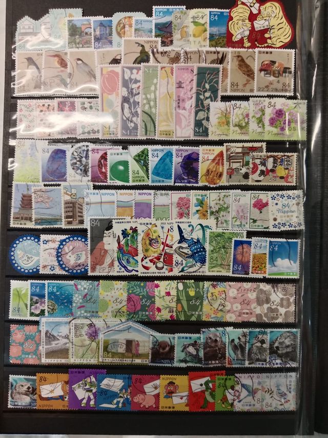 Classificador 1200 selos Japão 32 páginas