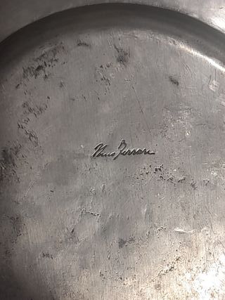 Coppia di piatti decorativi in peltro Nino Ferrari