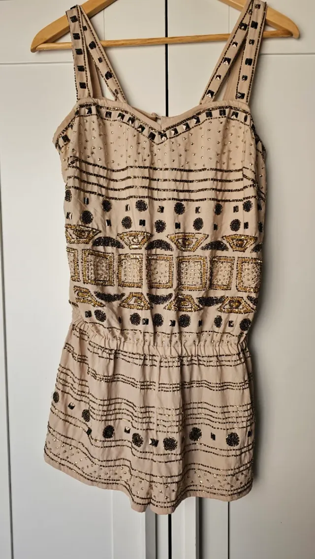 Mono corto Faust con pedrería