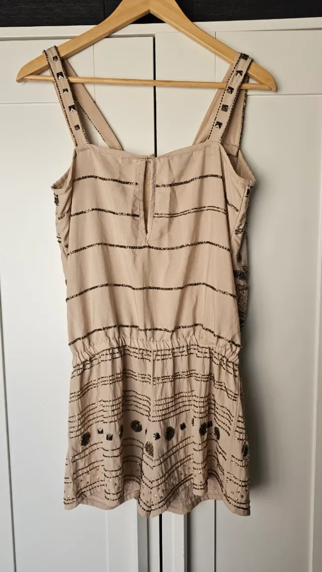 Mono corto Faust con pedrería