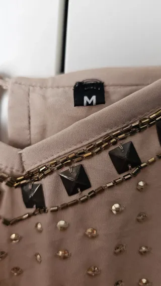 Mono corto Faust con pedrería