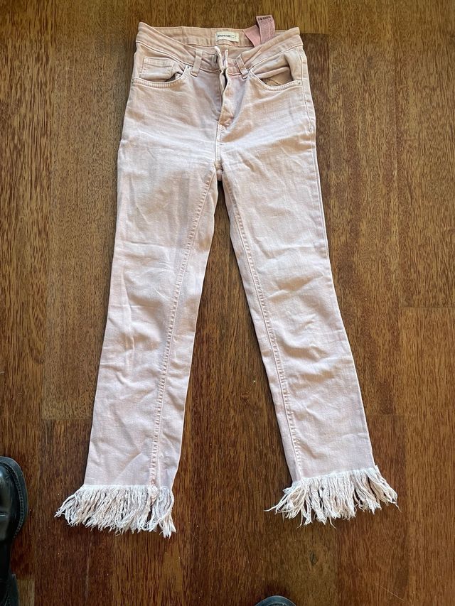 Jeans Brownie rosas con flecos