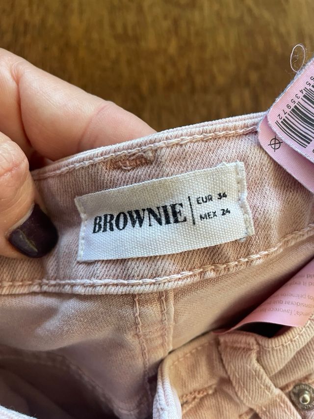Jeans Brownie rosas con flecos