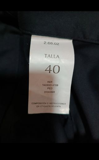 Pantalón negro tiro alto pata ancha