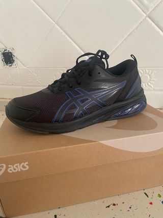 Zapatillas deportivas Asics negras y azules