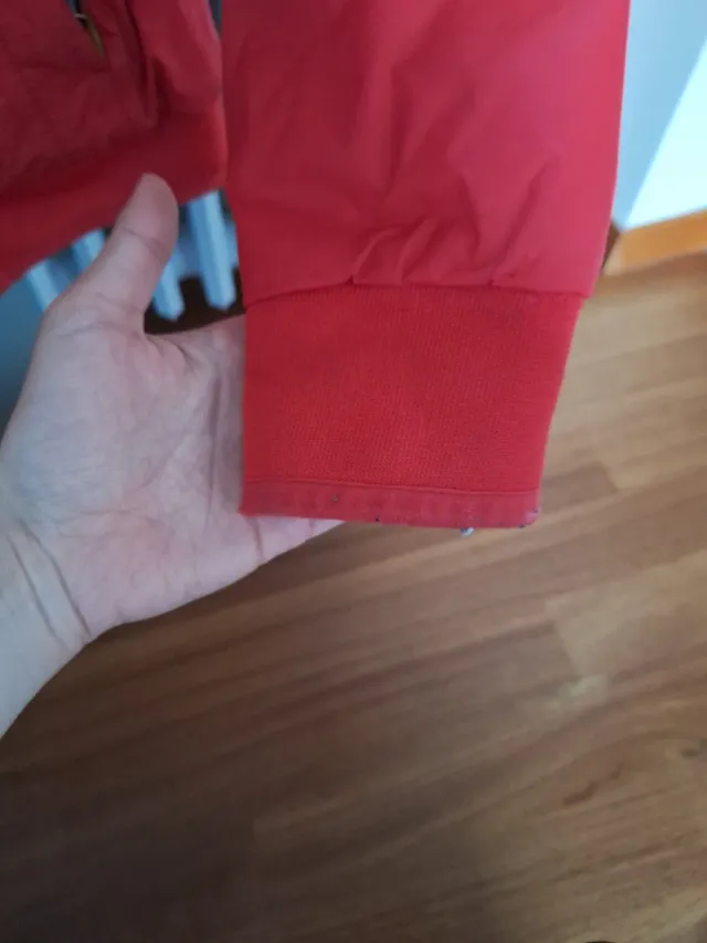 Giacca K-Way donna double face rosso e blu.