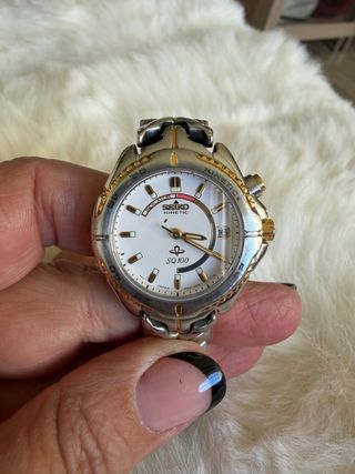Reloj Seiko Kinetic SQ 100 Oro y Plata