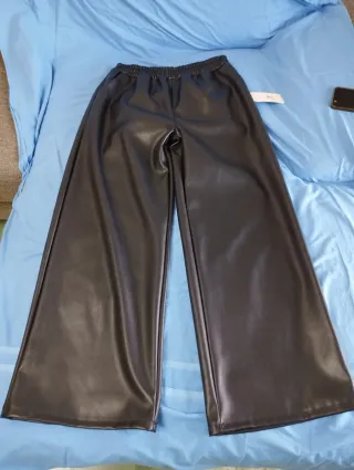 Pantaloni ecopelle vita alta gamba larga