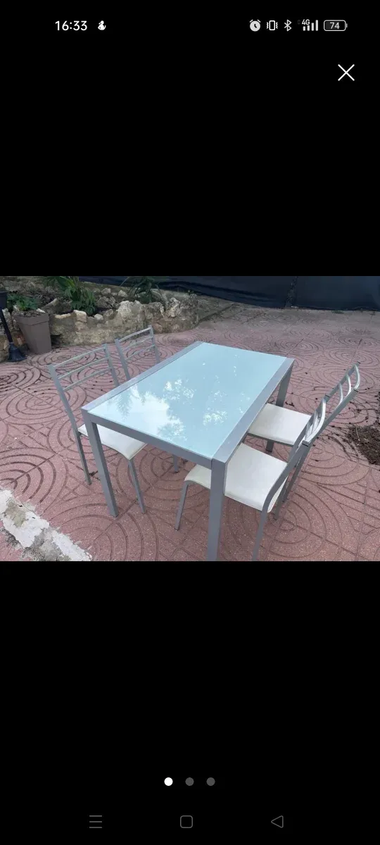 Mesa de cristal y 4 sillas