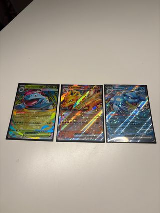 Trío de cartas Pokémon EX