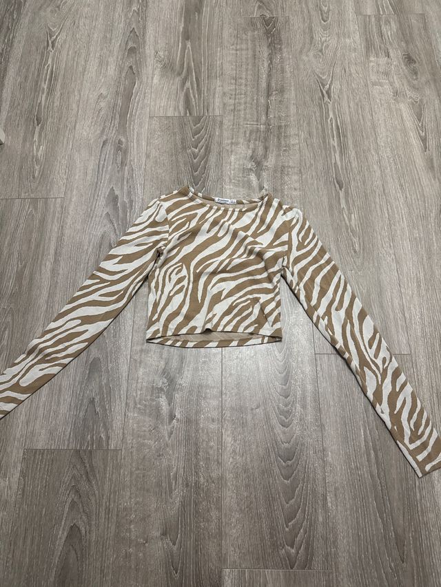 Top cebra manga larga beige y blanco