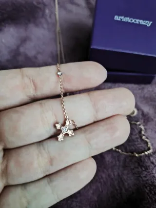 Collar y pulsera Aristocrazy cruz oro rosa